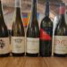 Review Exclusive Wine Experience - botles of wines on a table