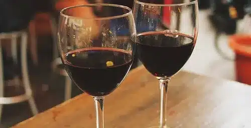 two glasses of wine on a table