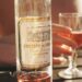 Cinsault Grape Variety In Provence - a bottle of rosé wine with a glass of rosé wine