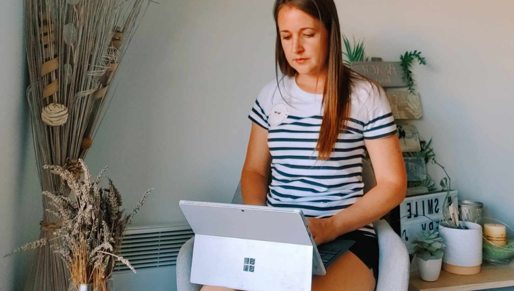 me sitting and writing on a computer